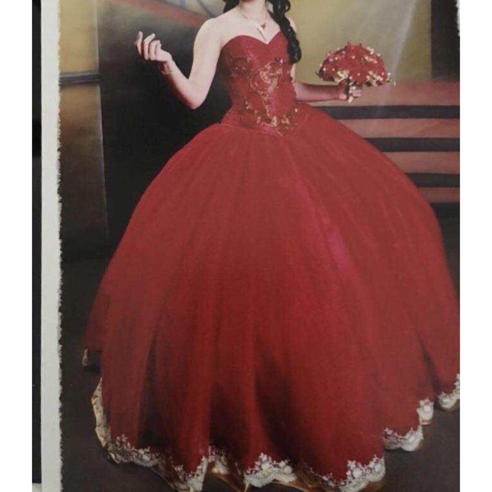 Red embroidered quinceañera dress